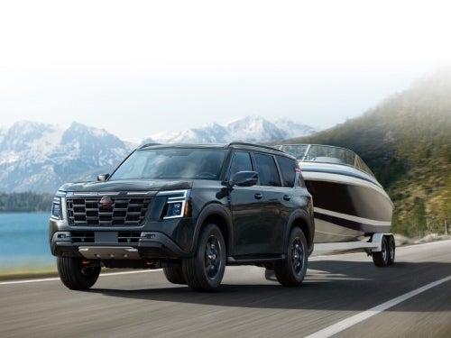 2025 Nissan Armada towing a boat